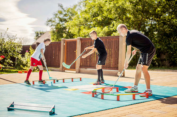 Home advantage. The need for a floorball practice field with tiles for every player